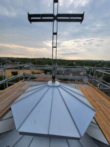 Metal roof top arial view of a church Dolan Roofing & Construction in San Antonio, TX