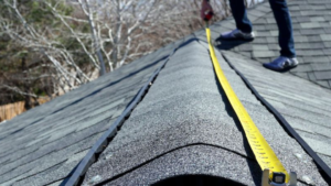 Dolan Roofing & Construction roofing contractor in a process of roof measurement for roof repairs san antonio, TX